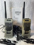 Set 2 Uniden HH940 Waterproof And Submersible Marine Radio W/wall & Car Chargers. Fixed Price $35.00.