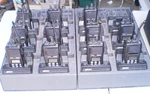 Lot Of 11 Macom Ericsson LPE-200 800 Mhz Way Portable 3W Radios + Charging Bas. Fixed Price $50.00.