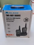 Midland X-talker T51VP4 Two-way Radios 28 Mile Range Headsets Included Black Nib. Fixed Price $34.99.