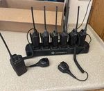Motorola RDU4100 Portable Handheld Two-way Radios Multi-unit Charger Microphones. Fixed Price $750.00.
