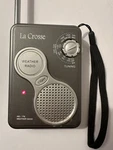 La Crosse Gray Am/fm Noaa Weather Band Handheld Radio Model 809-905. Fixed Price $5.00.