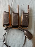 Motorola Tlkr T60 Two-way Radios Set Of 3 Black/yellow With Charger. Fixed Price $58.00.