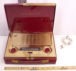 General Electric Model 145 Transistor Radio In Red & Gold. Fixed Price $124.99.