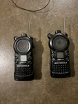 Motorola CLS1110 Two-way Radio- Of + Headsets And Chargers- For Parts. Fixed Price $60.00.