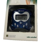 Rare New 2001 Oregon Scientific Transparent Blue RM313PA Projection Alarm Clock. Fixed Price $134.99.