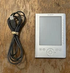 Sony PRS-300 Ebook Reader Silver Works. Fixed Price $54.49.