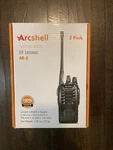 Set Of Arcshell AR-5 Two-way Walkie Talkies With Charger And Earpieces 2 Pack. Fixed Price $25.00.