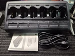 New In Box Motorola WPLN4121BR Impress 6 Bay Bank Battery Charger Display Oem. Fixed Price $132.00.