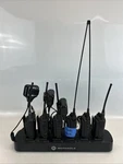 Motorola RDU4100 Commercial Walkie Talkies, Charging Station And Accessories. Fixed Price $499.99.