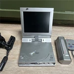 Audiovox DV-1680 Portable Dvd Player Silver 6.8" Wireless Remote Lithium Battery. Fixed Price $25.00.