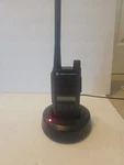 Pre-owned Motorola CP100D Walkie Talkie With Charging Stand. Fixed Price $200.00.