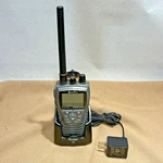 Cobra Marine HH350 Floating Handheld Vhf Lcd Radio Grey Orange W/ Charging Base. Fixed Price $69.00.