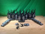 Midland GXT1000G 36-MILE 50-CHANNEL Radio Set W/ Charger, Earpeice, & Batterys. Fixed Price $46.00.