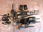 Lot Midland GXT860 2 Way Radios W/1 Charger, Ear Buds & (3 Batteries Is New). Fixed Price $65.00.