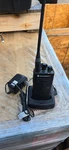 Motorola Rdx RDU4100 Two Way Radio, With Battery, Charging Base And Wall Adapter. Fixed Price $175.00.