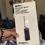 Vtg Courier Procom MU54 Uhf Fm Transceiver & Charger, Channel Still Nib. Fixed Price $35.00.