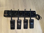 Lot Of 4 Motorola DTR600 Radios With Charger Bar For Units Pre-owned. Fixed Price $500.00.