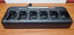 Original Motorola NNTN8410A 6 Pack Rapid Charger For CP200, CP200D And R2 Radios. Fixed Price $325.00.