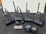 4 Motorola HT50 Portable Radio W/ Base Station Charger & Mics 2 New Batteries. Fixed Price $375.00.