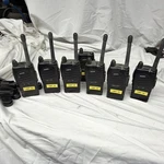 Maxon Lot Of 7 Portable Handheld Two-way Radios With Belt Clips & Charger Black. Fixed Price $50.00.