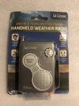 La Crosse Gray Am/fm Noaa Weather Band Handheld Radio Model 809-905. Fixed Price $19.99.