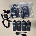 Lot Of 4 - Motorola XTS1500 H66UCC9PW5BN 2 Way Radios W/ Chargers And Mics. Fixed Price $275.00.