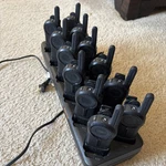 Motorola PMLN7135A Way Radio Walkies Talkies With Charging Dock Lot Of 12. Fixed Price $700.00.