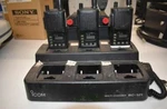 Complete Icom Two-way Radio System: 6 IC-F4S-4 Handhelds + BC-121N Multi Charger. Fixed Price $210.00.