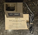 New Regency Land Mobile Carry Com Battery Charger Model MA-701. Fixed Price $18.00.