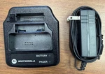 Motorola RLN5703, Minitor V Pager Drop Charger W/ Spare Battery Slot (used). Fixed Price $15.00.