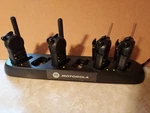 4 Motorola CLS1110 Uhf Radios Walkie Talkies With 6 Pocket Multi-unit Charger. Fixed Price $199.99.